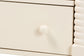 Baxton Studio Braith Farmhouse Ivory Spindle Wood 7-Drawer Dresser FredCo