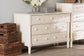Baxton Studio Braith Farmhouse Ivory Spindle Wood 7-Drawer Dresser FredCo