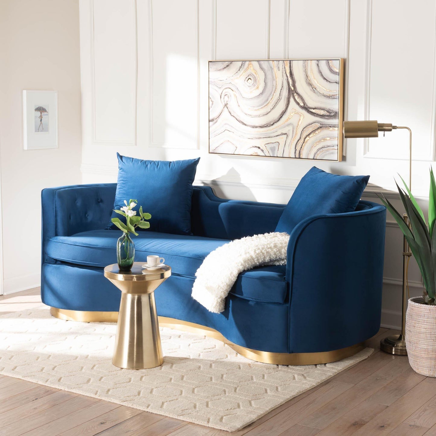 Baxton Studio Deserae Glam and Luxe Navy Blue Velvet and Brushed Gold Metal Sofa FredCo