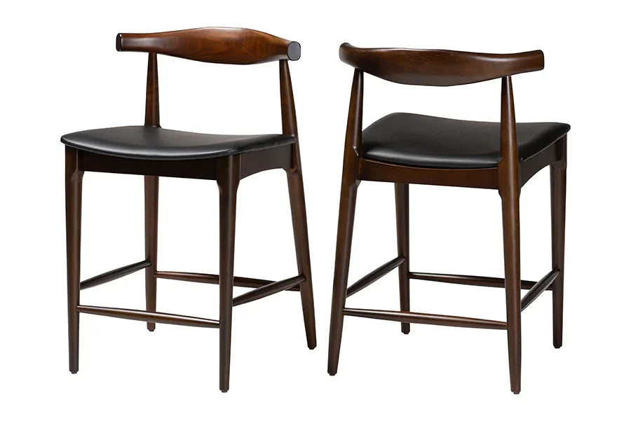 Baxton Studio Eira Counter Stool Set of 2- Walnut Wood Frame Counter-height Chair with Curved Backrest and Black Faux Leather Seat, Mid-Century Modern Kitchen Island Seating FredCo