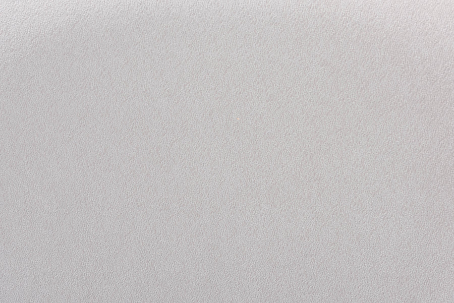 Light grey textured fabric upholstery, ideal for FredCo International furniture.