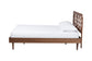 Mid-century modern wooden bed frame with geometric headboard and white bedding from FredCo International