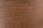 Close-up of mid-century modern wood grain table surface, dining furniture detail