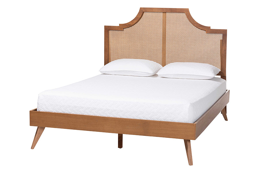 Mid-century modern wooden bed frame with a geometric headboard and white bedding