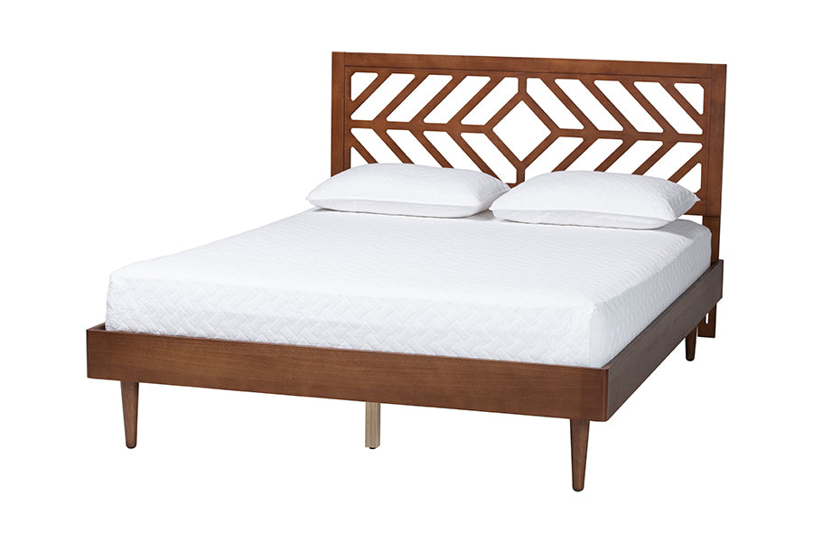 Mid-century modern wooden bed frame with geometric headboard and white bedding
