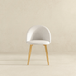 Modern white accent chair with gold legs, minimalist design, FredCo International furniture
