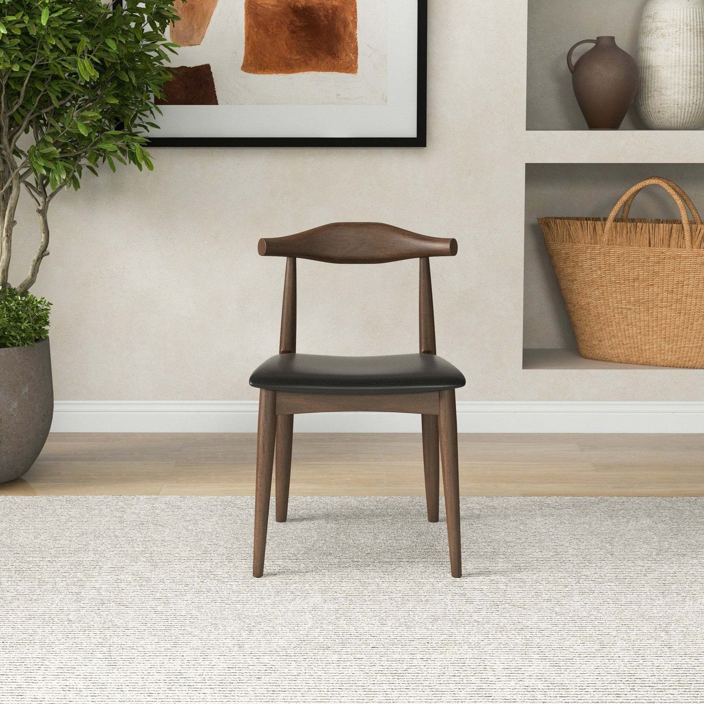 Modern wooden dining chair with black seat in a stylish home interior, FredCo furniture