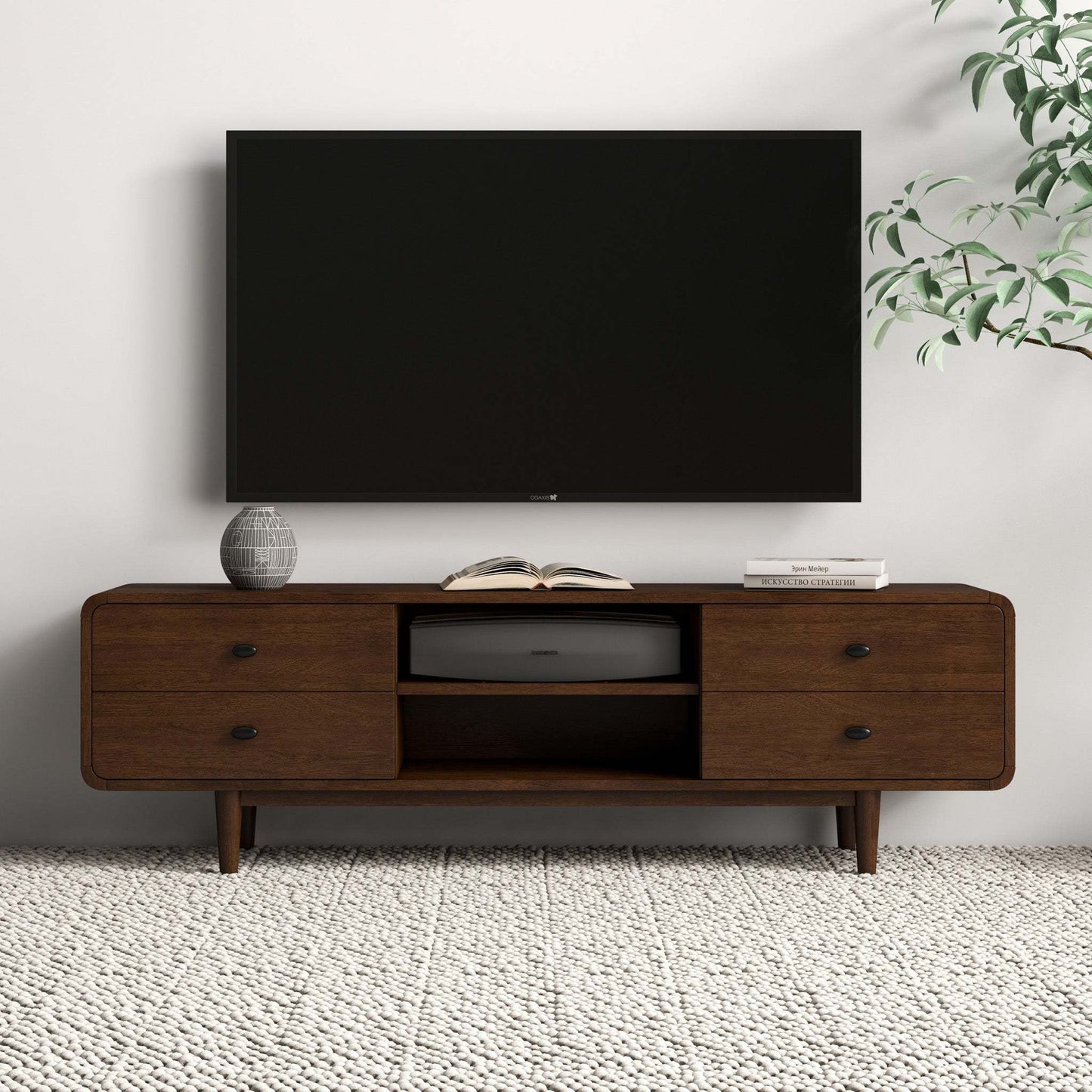 Modern wooden TV stand with drawers and decor in a living room, FredCo International furniture