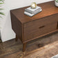 Mid-century modern wood console table with books and decor, FredCo International furniture