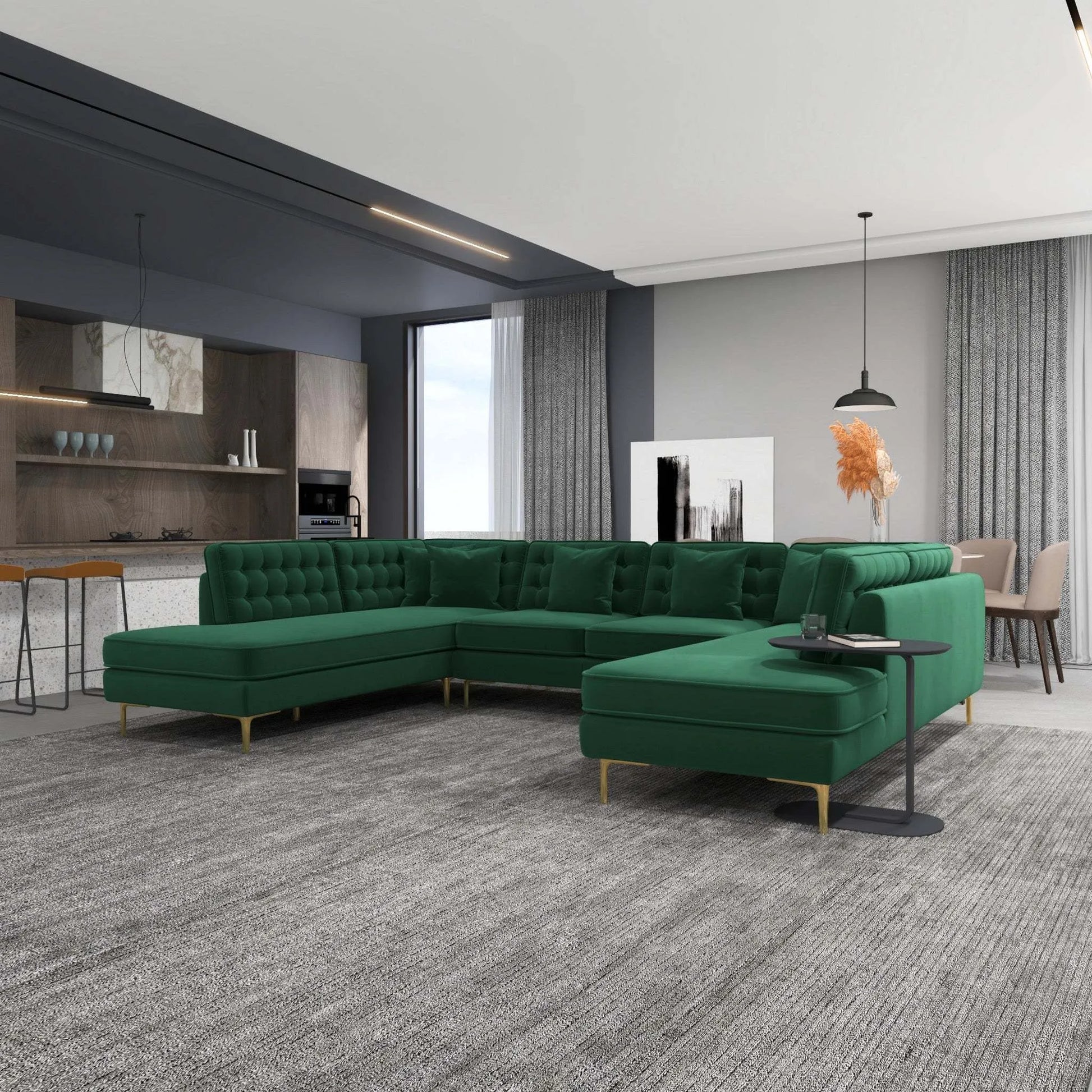 Modern living room with green velvet sectional sofa, gray rug, and open kitchen in stylish home