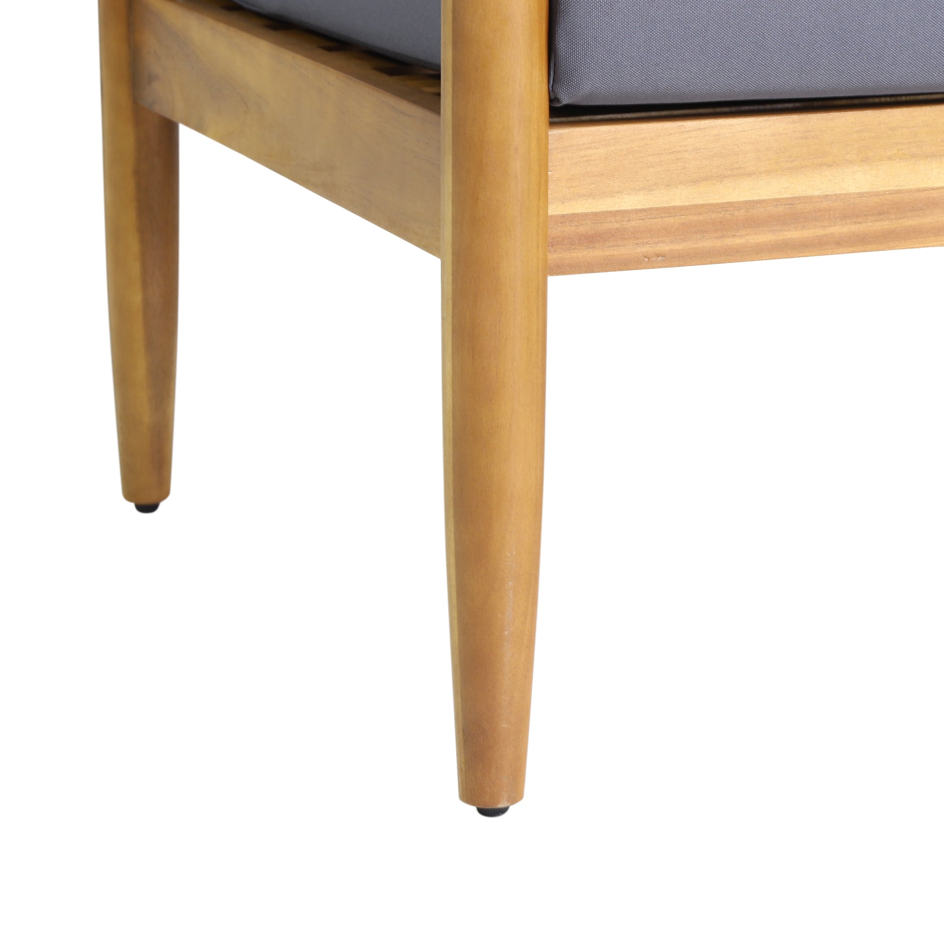 Modern wood chair leg with a gray cushion, furniture detail from FredCo International