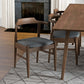 Modern wood dining chair with gray cushion at dining table on patterned rug, FredCo International