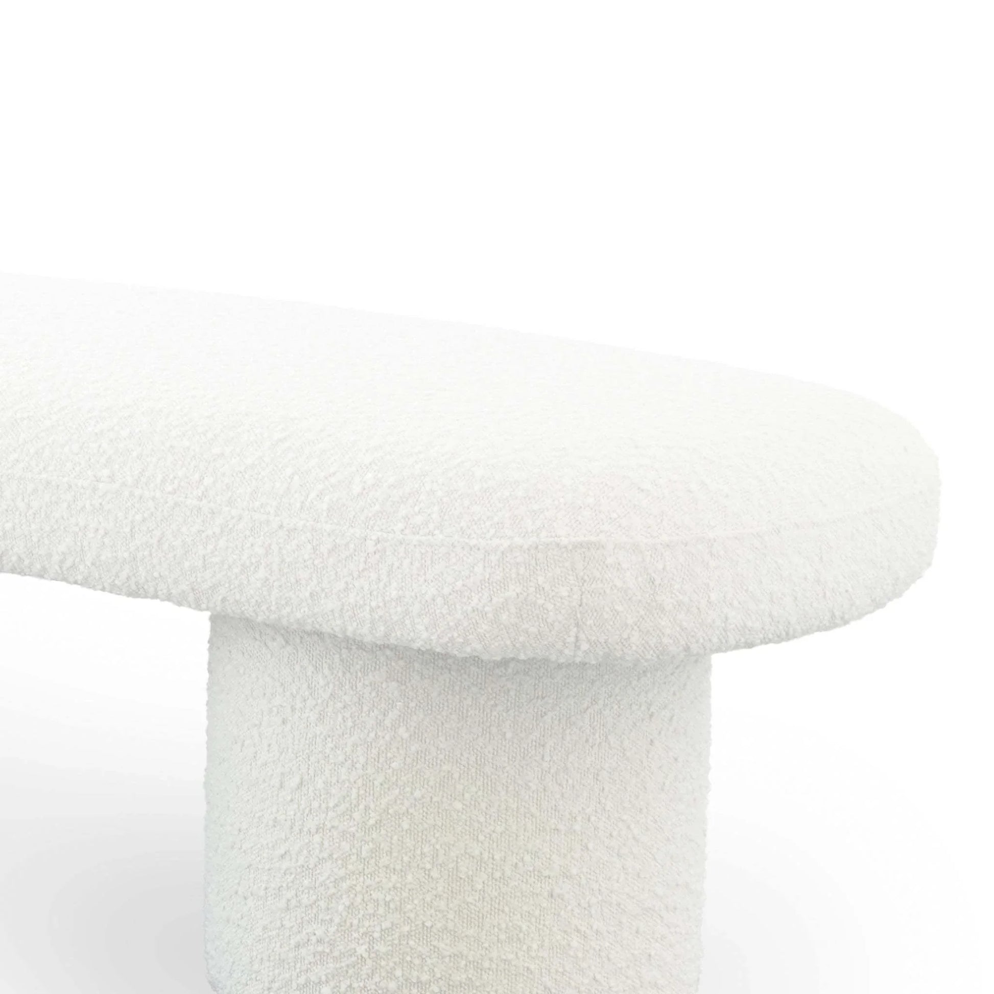 Modern white boucle upholstered bench with rounded edges, FredCo International furniture