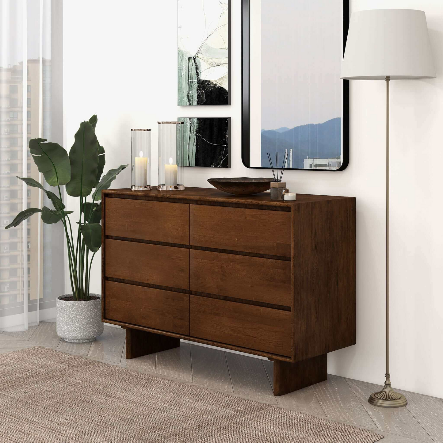 Modern wood dresser with six drawers in a stylish home setting, next to a floor lamp and plant
