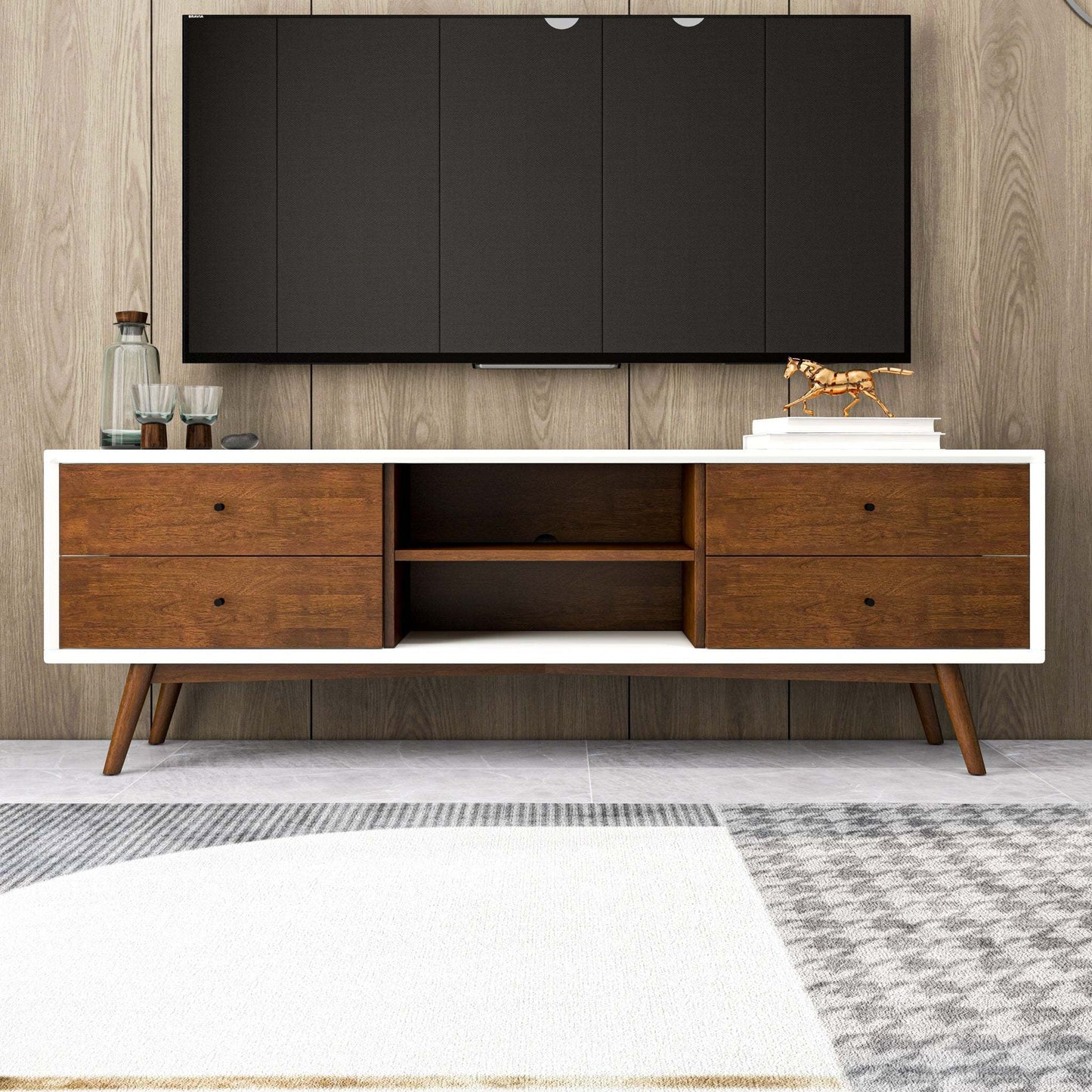 Modern wood TV console with drawers, decor accents, and TV on wood panel wall, FredCo International furniture