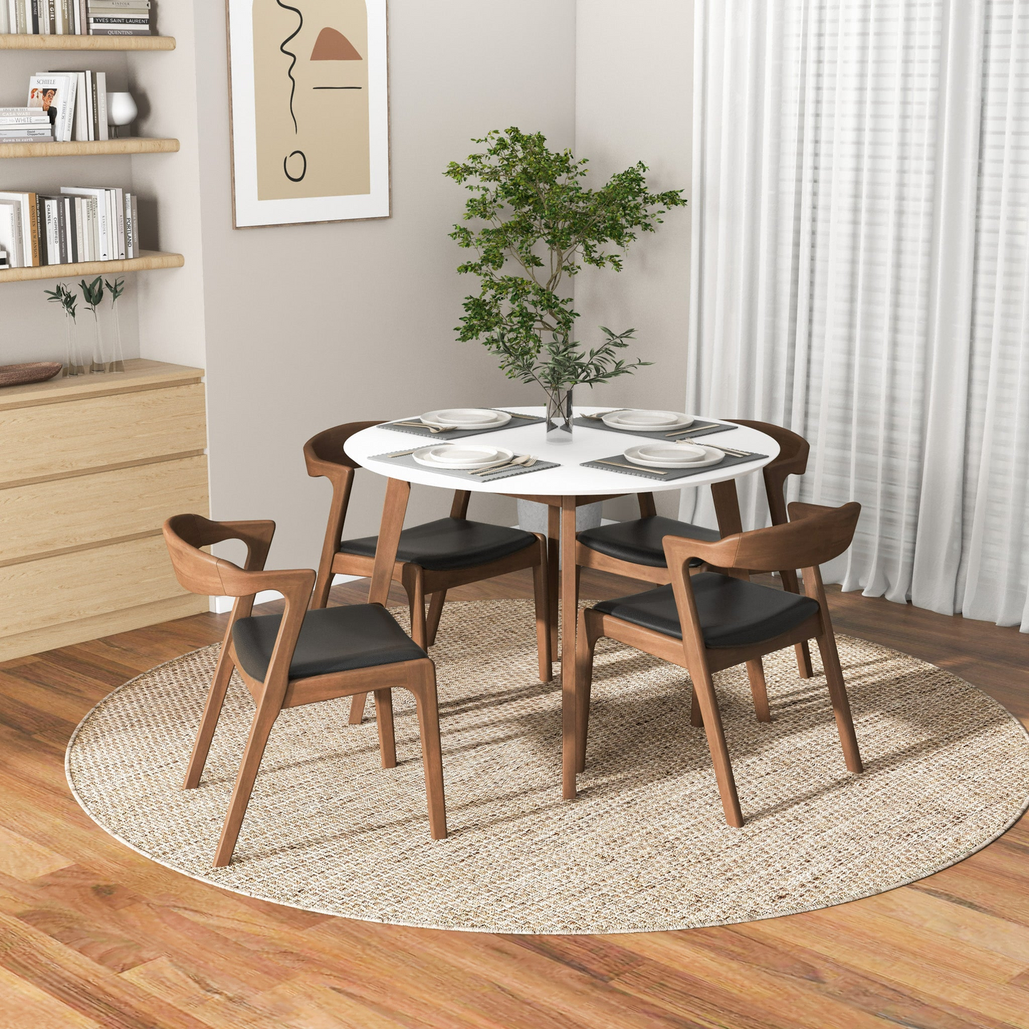 Modern dining room with round white table, four wood chairs, and minimalist decor