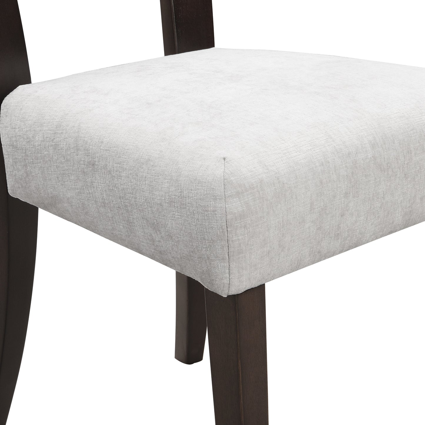 Close-up of modern dining chair with light gray upholstered seat and dark wood legs