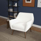 Modern white accent chair with wooden legs in stylish living room, FredCo International furniture