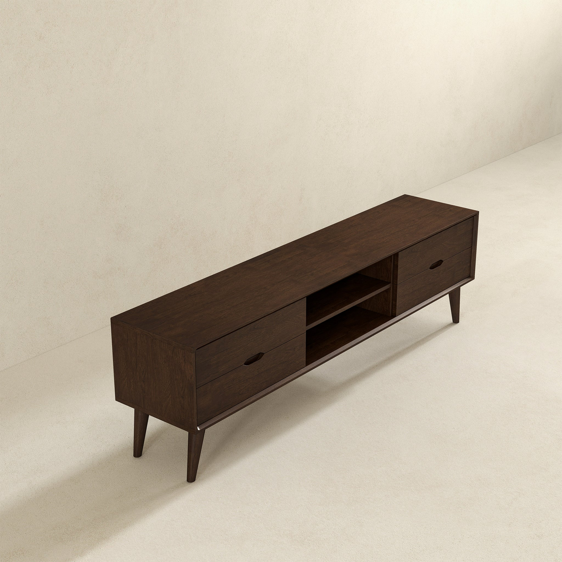 Modern dark wood TV stand with drawers and open shelves on beige floor, FredCo International furniture