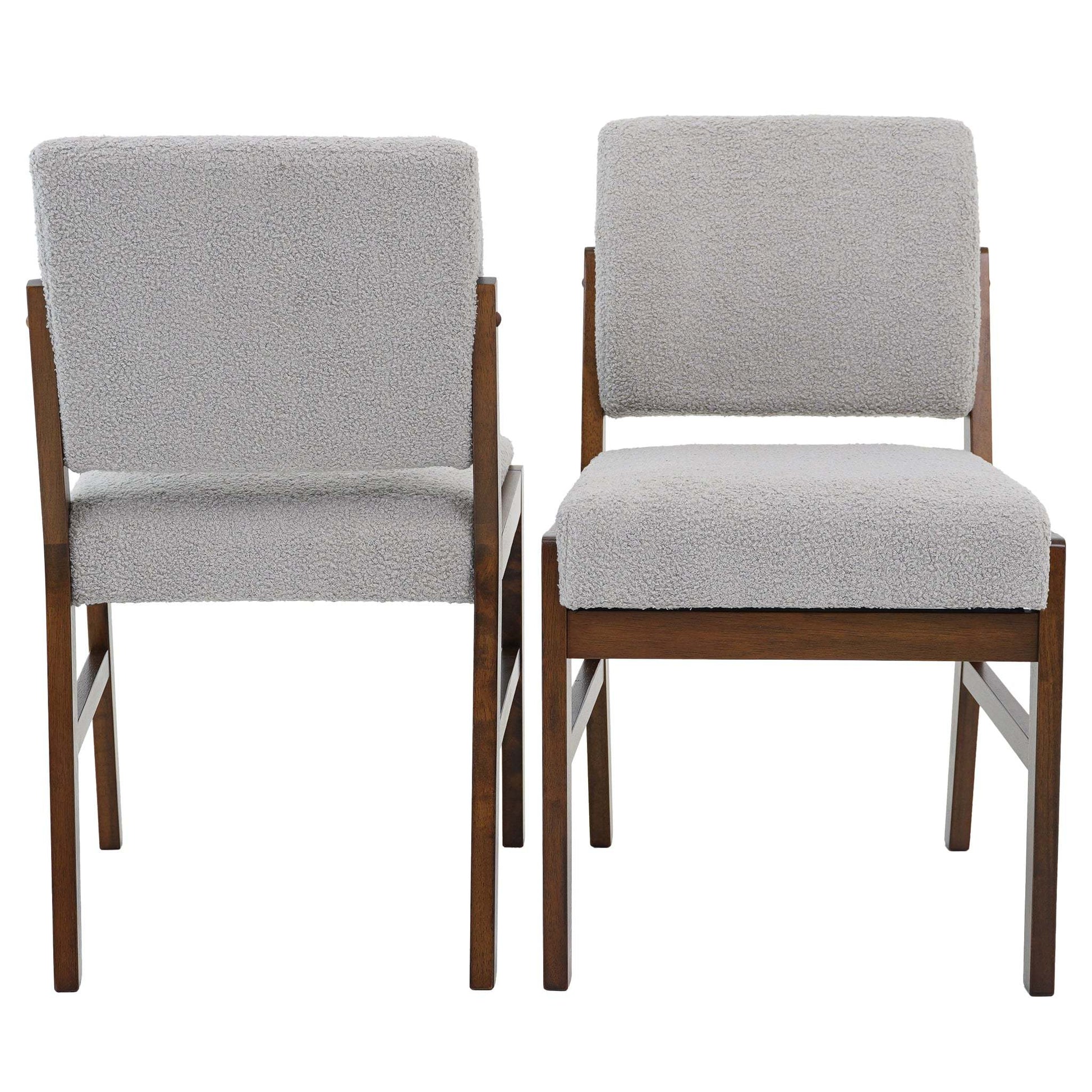 Set of two modern dining chairs with light gray fabric and wooden frames from FredCo International
