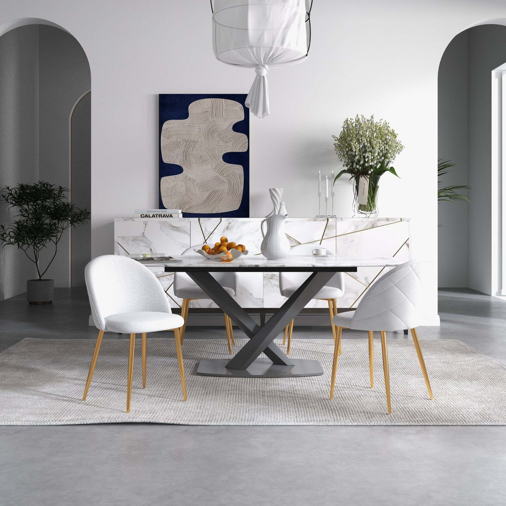 Modern dining room with marble table, white chairs, abstract wall art, and elegant decor