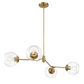 Modern brass chandelier with four clear glass globe lights, FredCo International furniture