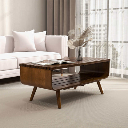 Modern wooden coffee table with vase and magazine in stylish living room with white sofa