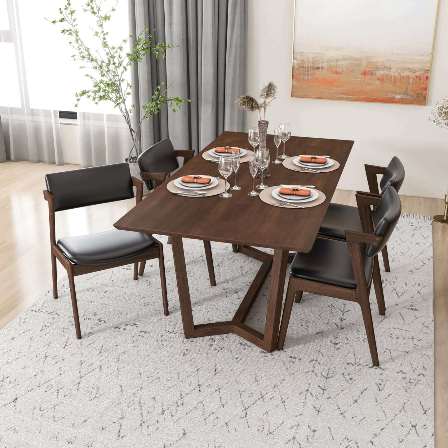 Modern rectangular wooden dining table set with four black cushioned chairs in stylish home décor