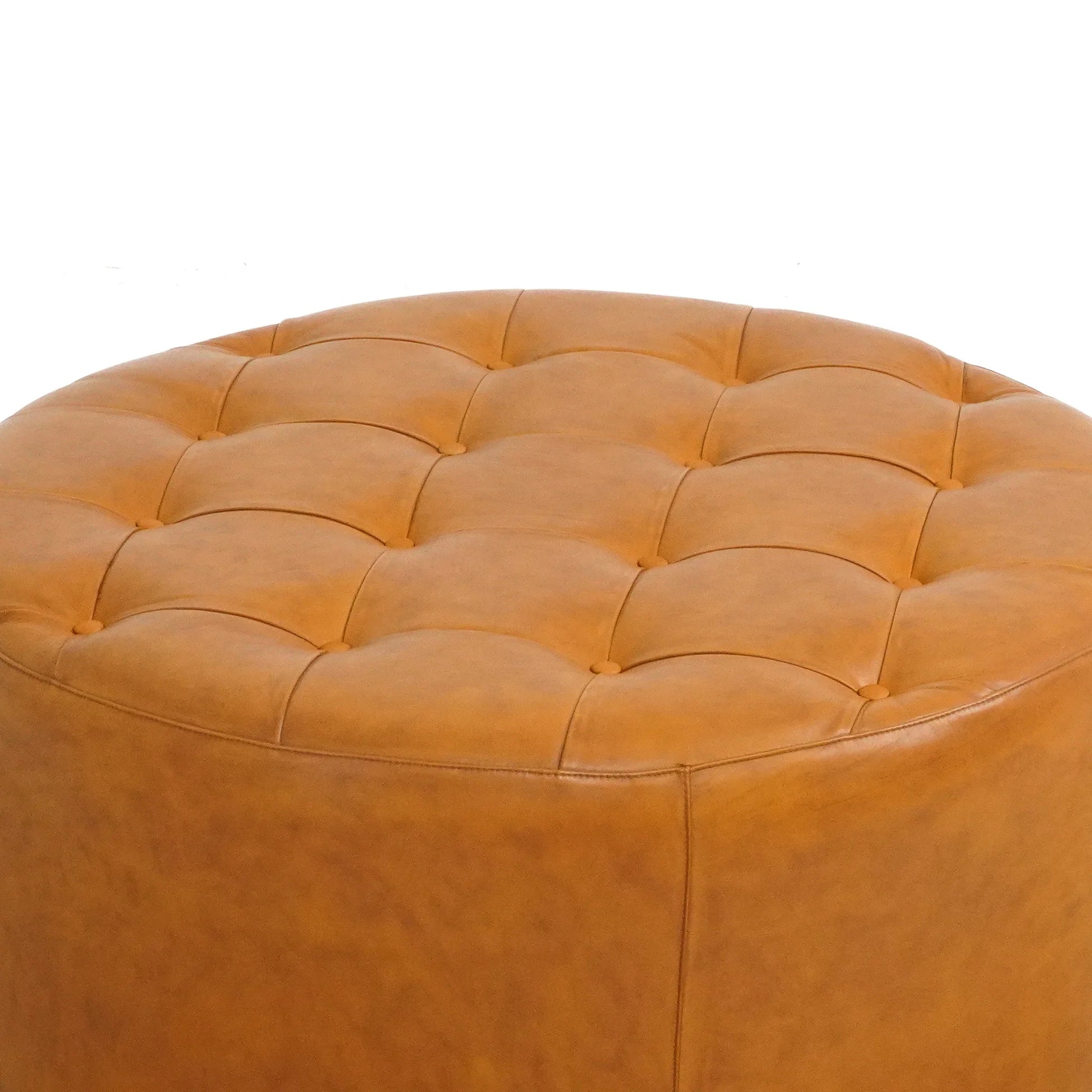Round tufted tan leather ottoman, modern accent furniture from FredCo International