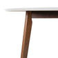 Modern wood dining table with angled brown leg and white tabletop from FredCo International