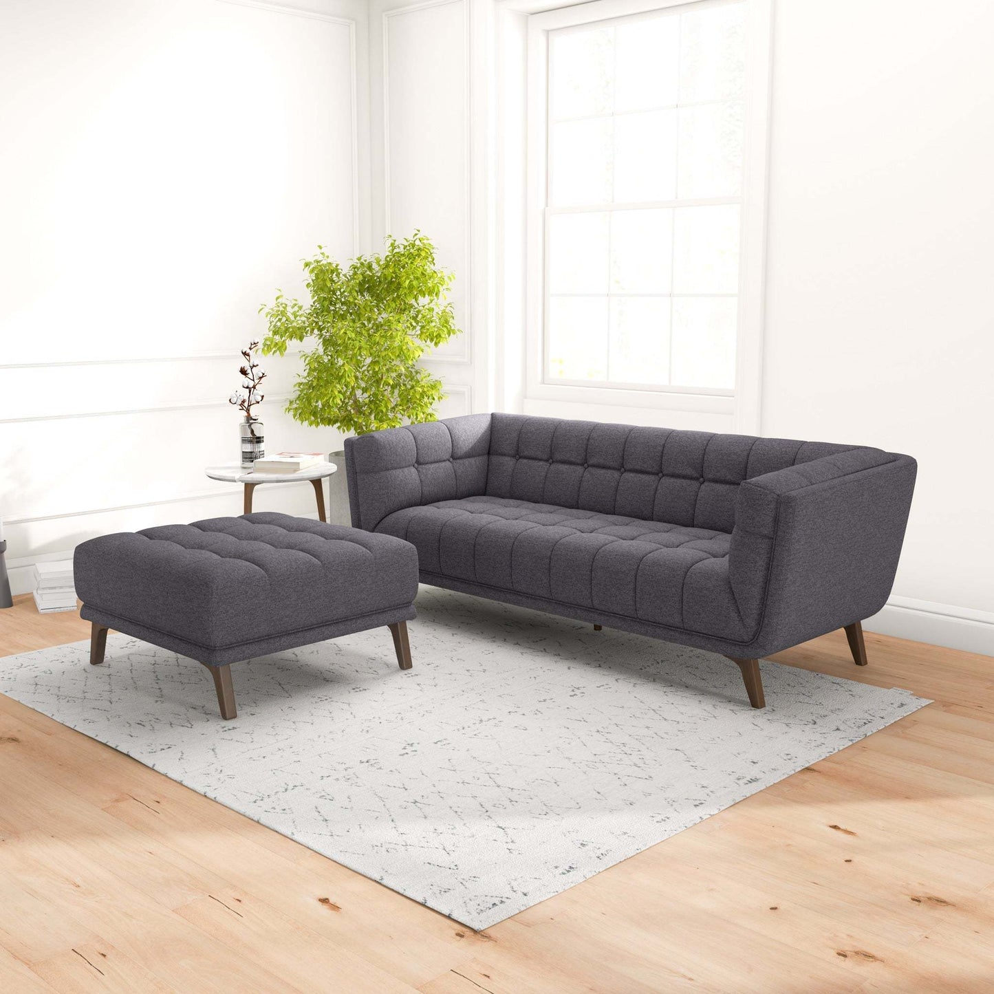 Modern gray sofa and ottoman set in bright living room, FredCo International furniture