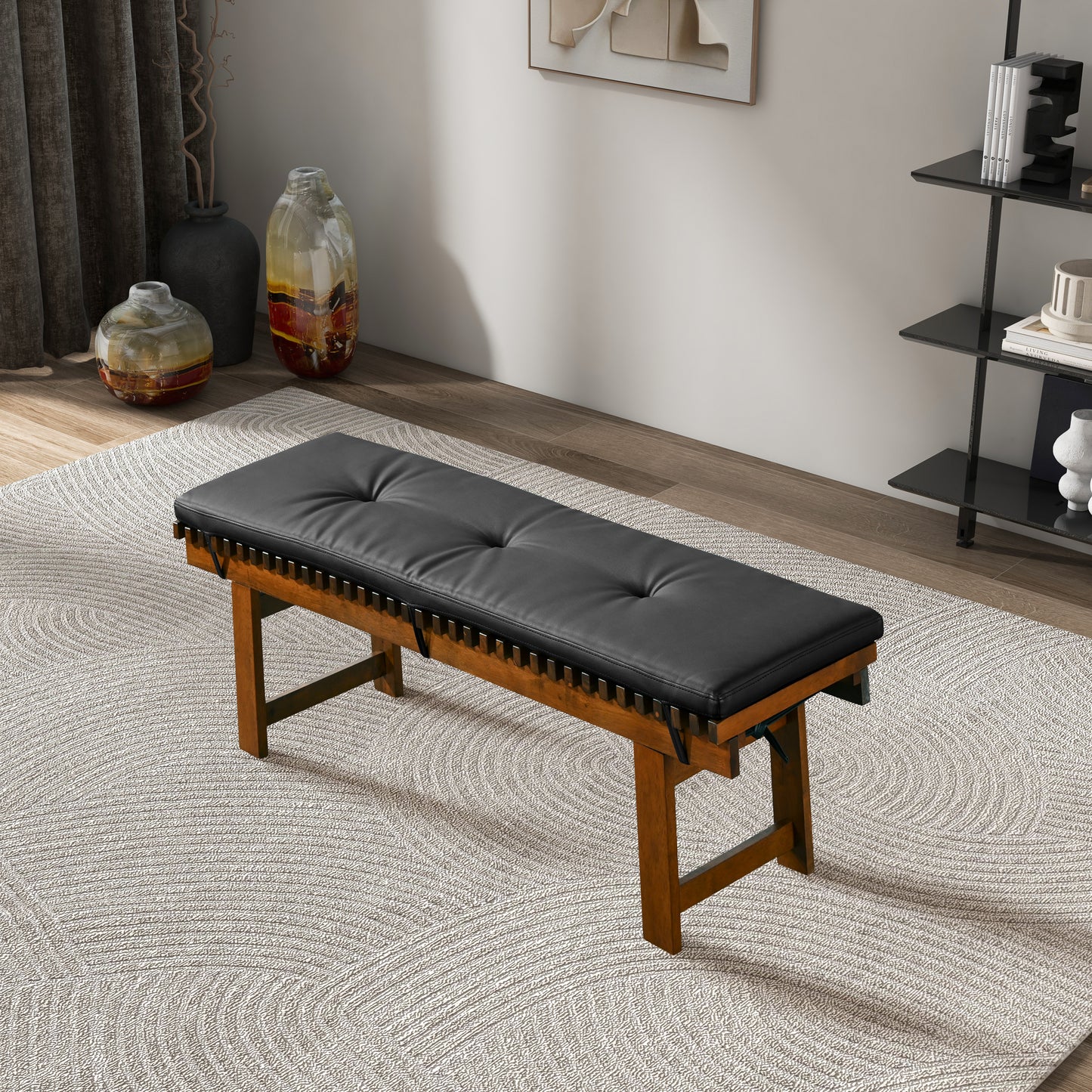 Modern wooden bench with black tufted cushion in stylish living room, FredCo International furniture