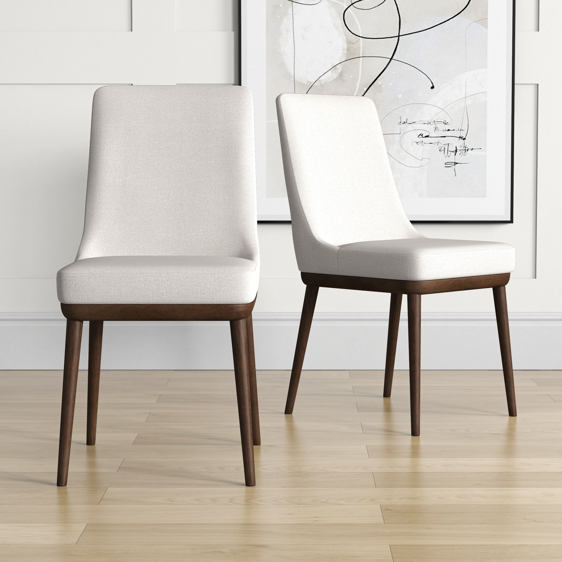 Modern upholstered dining chairs with wooden legs in a bright, minimalist home interior