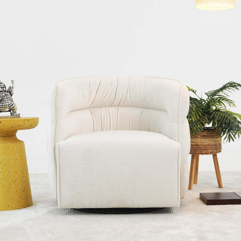 Modern cream accent chair in contemporary living room with yellow table and indoor plant