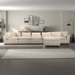 Modern beige sectional sofa in a stylish living room with wall art and decor, FredCo International furniture
