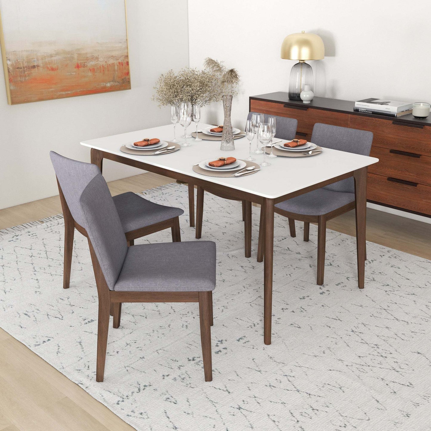Modern dining room set with gray chairs, wood table, sideboard, and neutral decor from FredCo International.