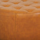 Tufted tan leather ottoman close-up, modern home furniture from FredCo International