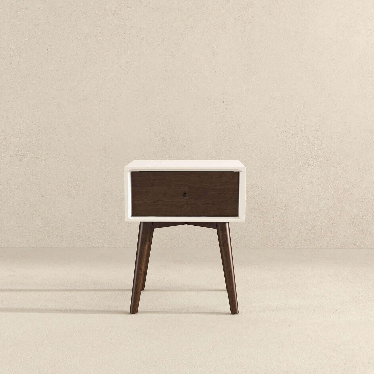 Mid-century modern wooden nightstand with white frame and single drawer on light background