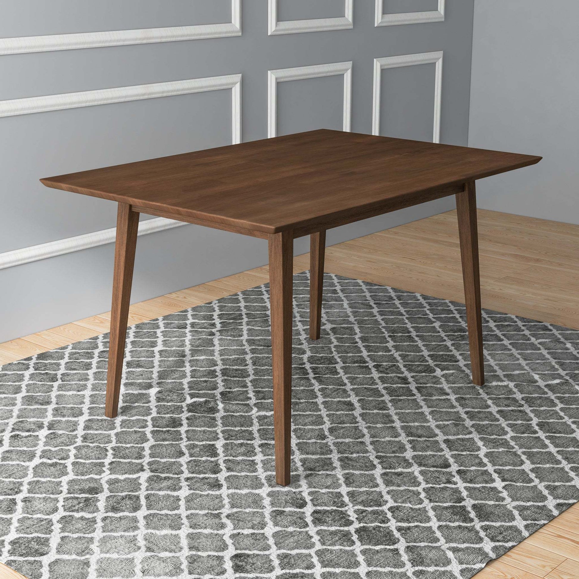 Modern wooden dining table on gray patterned rug in stylish home interior, FredCo International