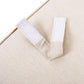 Close-up of beige fabric storage box lid with Velcro strap, FredCo International furniture