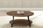 Steve Silver Denise - Oval Cocktail Table - Brown DN200C FredCo
