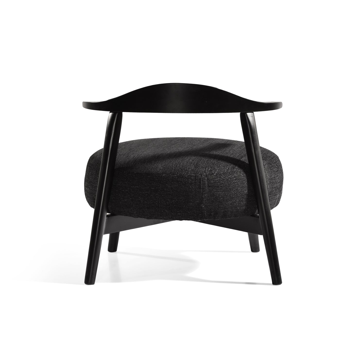 Modern black accent chair with curved backrest and cushioned seat on white background