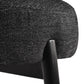 Close-up of modern black fabric chair seat with sturdy black leg, FredCo International furniture