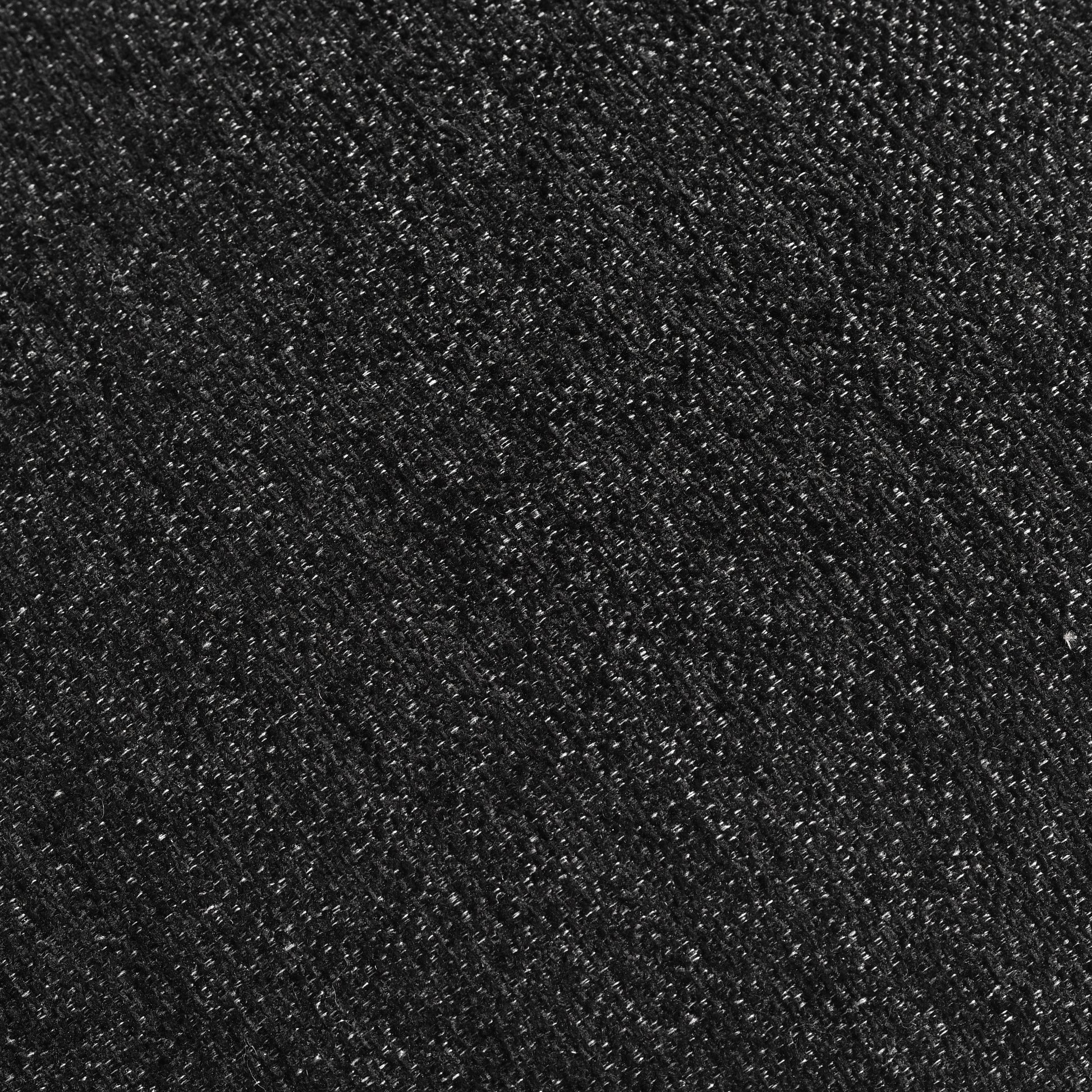 Close-up of black textured upholstery fabric, modern furniture material by FredCo International