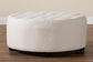 Athena Modern and Contemporary Ivory Boucle Upholstered and Black Finished Wood Round Ottoman FredCo