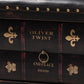 Charlier Rustic Antique Inspired Dark Brown Faux Leather Upholstered Wood Storage Ottoman with Book Spine Drawer FredCo