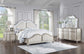 Evangeline 4-piece Upholstered Platform Eastern King Bedroom Set Ivory and Silver Oak Coaster FredCo