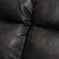 Roland Modern and Contemporary Black Faux Leather 2-Piece Sectional with Recliner and Storage Chaise FredCo