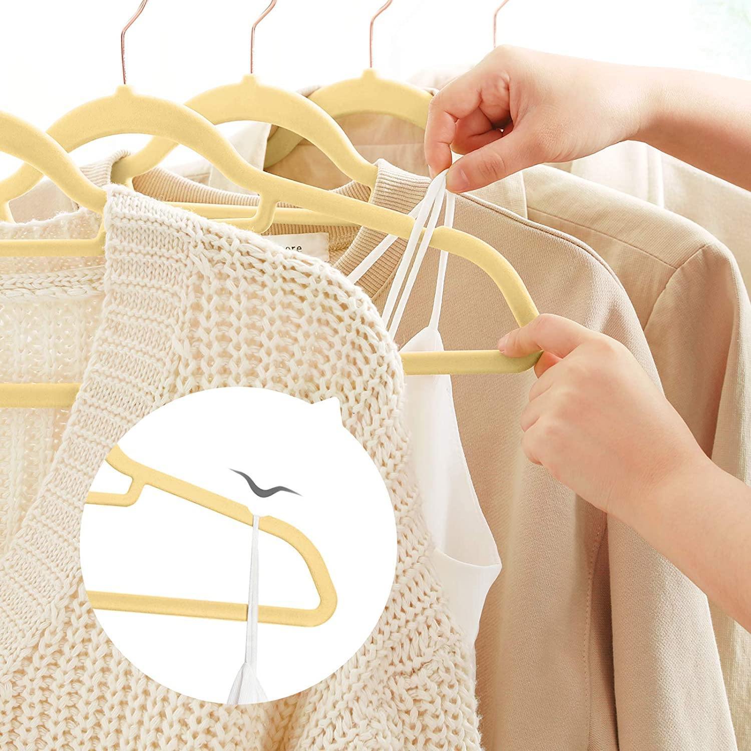 https://www.thefredco.com/cdn/shop/products/yellow-velvet-non-slip-clothes-hangers-50-pack-5-23067654258879.jpg?v=1696851598